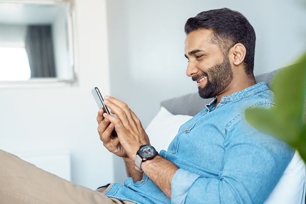 A man reading his smartphone