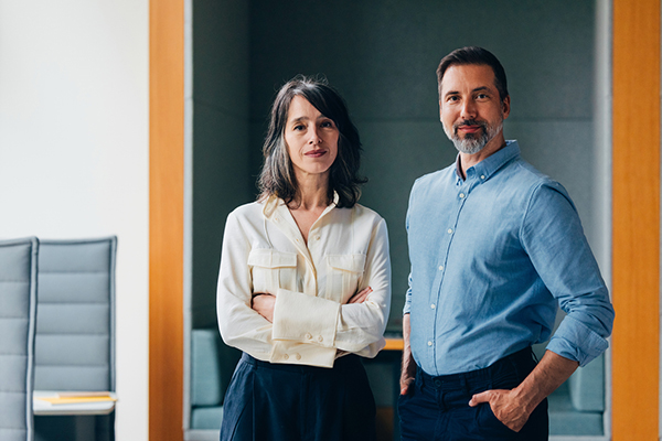 Two people in their fifties at work