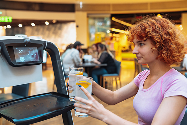Robotic waiter delivering drinks