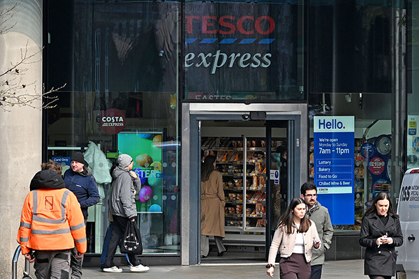 Tesco store and consumers, Getty