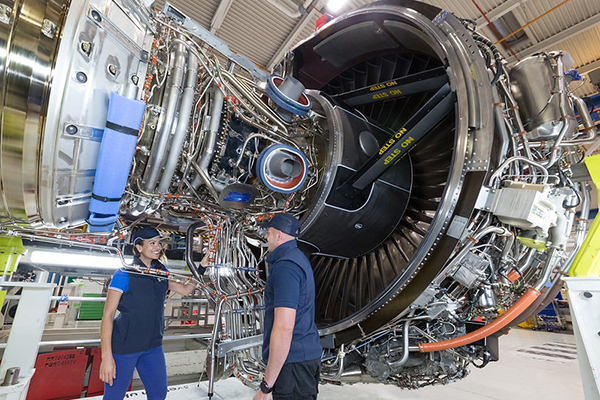 Rolls-Royce employees with a Trent XWB. pic via Flickr