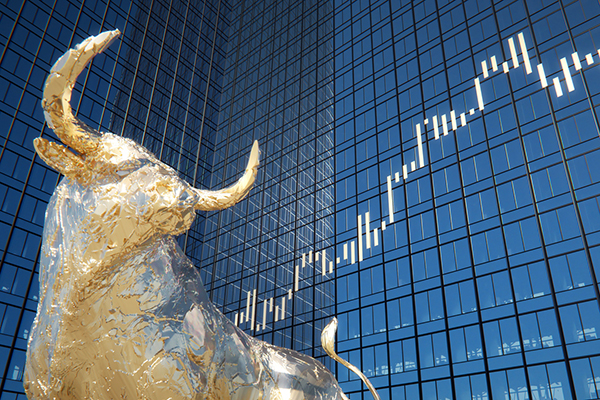 Gold bull against office buildings