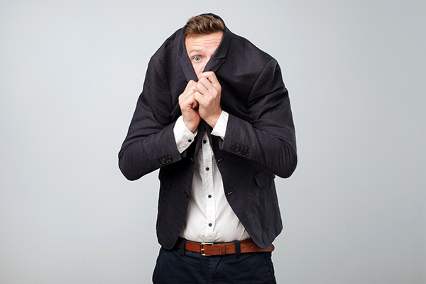Fund manager hiding inside suit jacket
