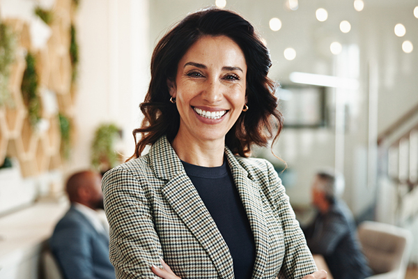 Fund manager smiling in the office