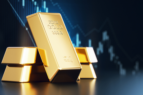 Gold bars against market chart