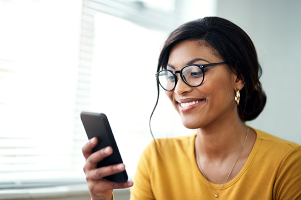 Beginner investor looking at phone
