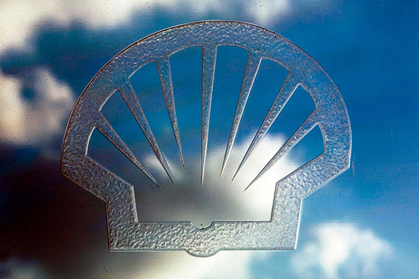 Shell logo against blue sky, Getty