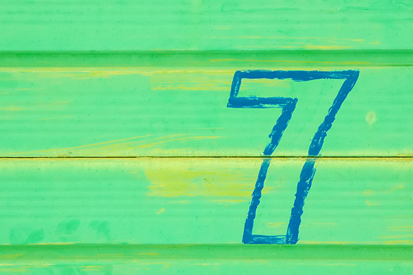 Number seven on green background
