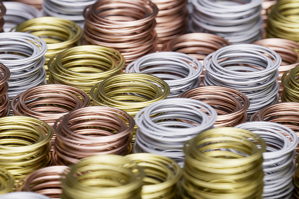Copper, gold and silver rings