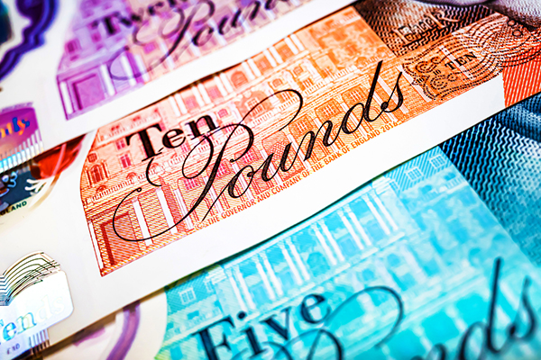 Colourful bank notes in a fan