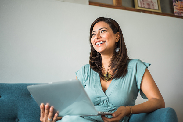Happy investor with laptop