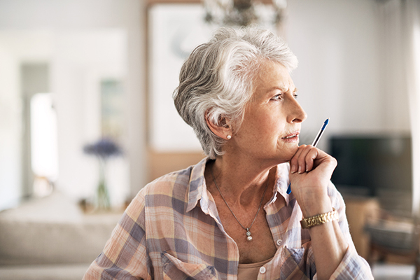 Woman considering high yield trust
